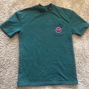 Men’s deep green shirt.